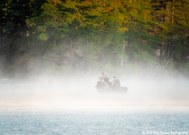 <div class="text-large">canoeing on foggy lake</div>