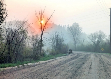 <div class="text-large">dirt road at sunrise</div>